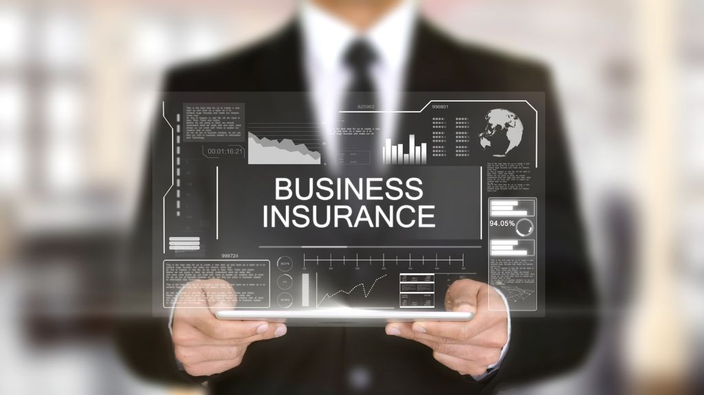 Man in Suit with Business Insurance Graphic and Graph